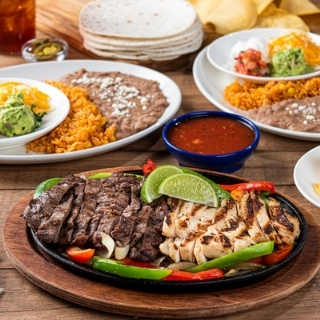 Classic Fajitas for Two: Choose any two Classic Fajita styles plus double the sides including hand-pressed flour tortillas, pico de gallo, cheese, Mexican rice and choice of beans.